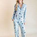 Modal wearing Long-Sleeved Women's Pajama Set in Vintage Hockey print on a beige background
::: Model is 5'10" wearing size S ///
---PJ 4