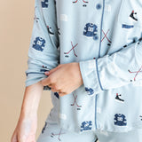 Modal showcasing the sleeves of Long-Sleeved Women's Pajama Set in Vintage Hockey print on a beige background
---1605 1