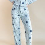 Modal showcasing the front of Long-Sleeved Women's Pajama Set in Vintage Hockey print on a beige background
---1605 3