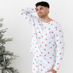 Male model standing looking off to the side with one hand behind his head and the other in the pants pocket of the Men's Jogger Set in Vintage Santa