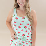 Smiling female wearing the Women’s Tank Set in Watermelon