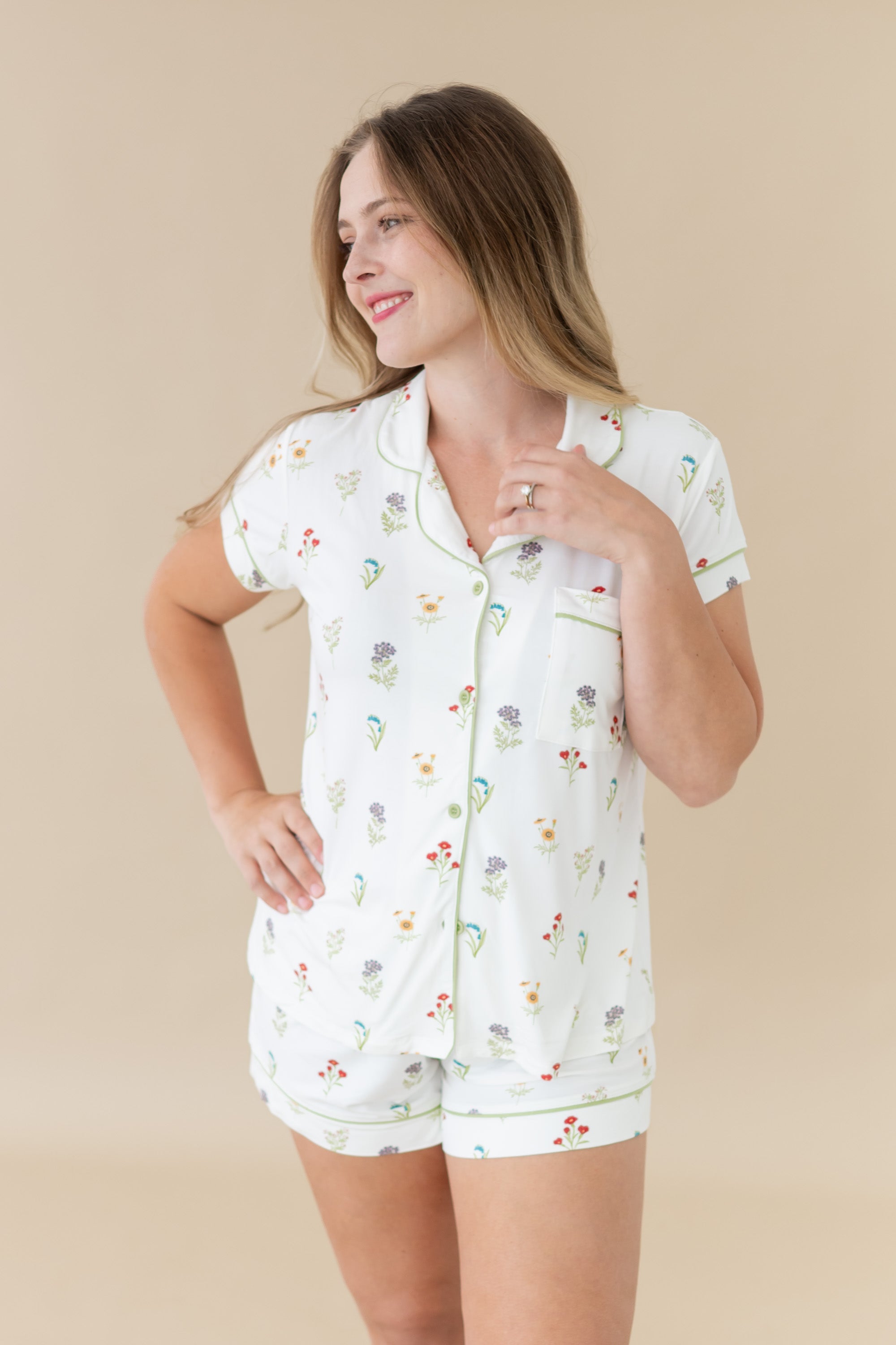 Woman modeling Women’s Short Sleeve Pajama Set in Wildflower looking off to side