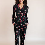 Woman smiling with both of her hands in her pajama pant pockets in winter wonderland print
::: Model is 5'10" wearing size XS Tall ///
---PJ 4