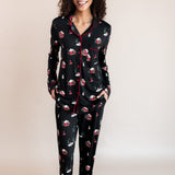 Woman smiling with both of her hands in her pajama pant pockets in winter wonderland print
::: Model is 5'10" wearing size XS Tall ///
---PJ 4