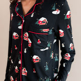 Womans top half with her hand in her pajama pocket in winter wonderland long sleeve pajama set

---PJ 2