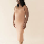 Female wearing the Women's Ribbed Cami Dress in Latte