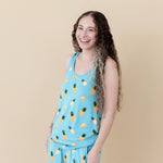 Woman laughing and wearing Women’s Tank Set in Pineapple