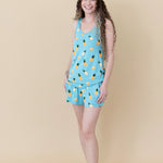 Woman modeling Women’s Tank Set in Pineapple with hands in pockets