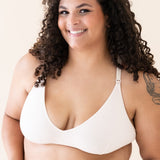 Woman wearing Blonde Nursing Bra with a plain background