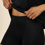 Close up of the Women's Boxer in Midnight show casing the waist band on a model 