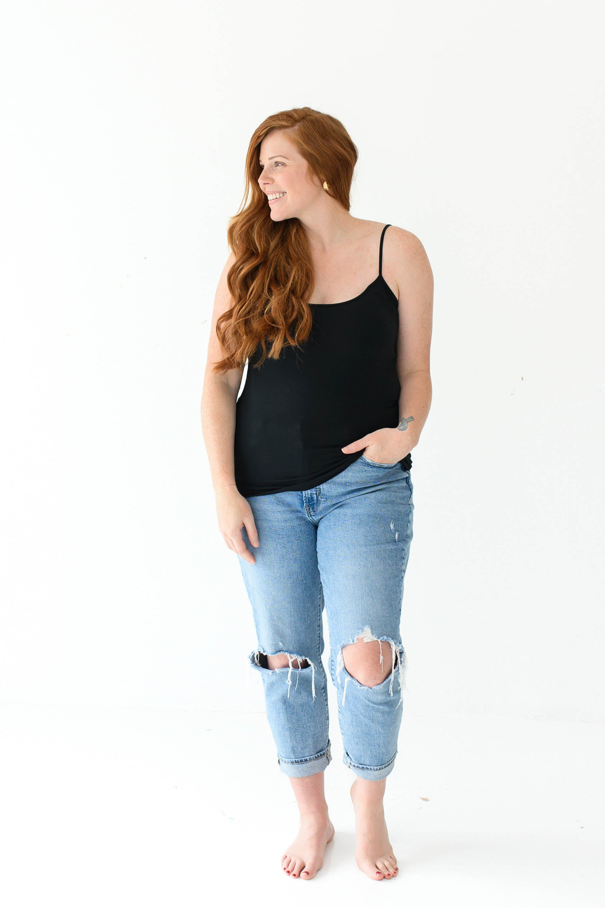Model in the Women’s Camisole in Midnight and jeans