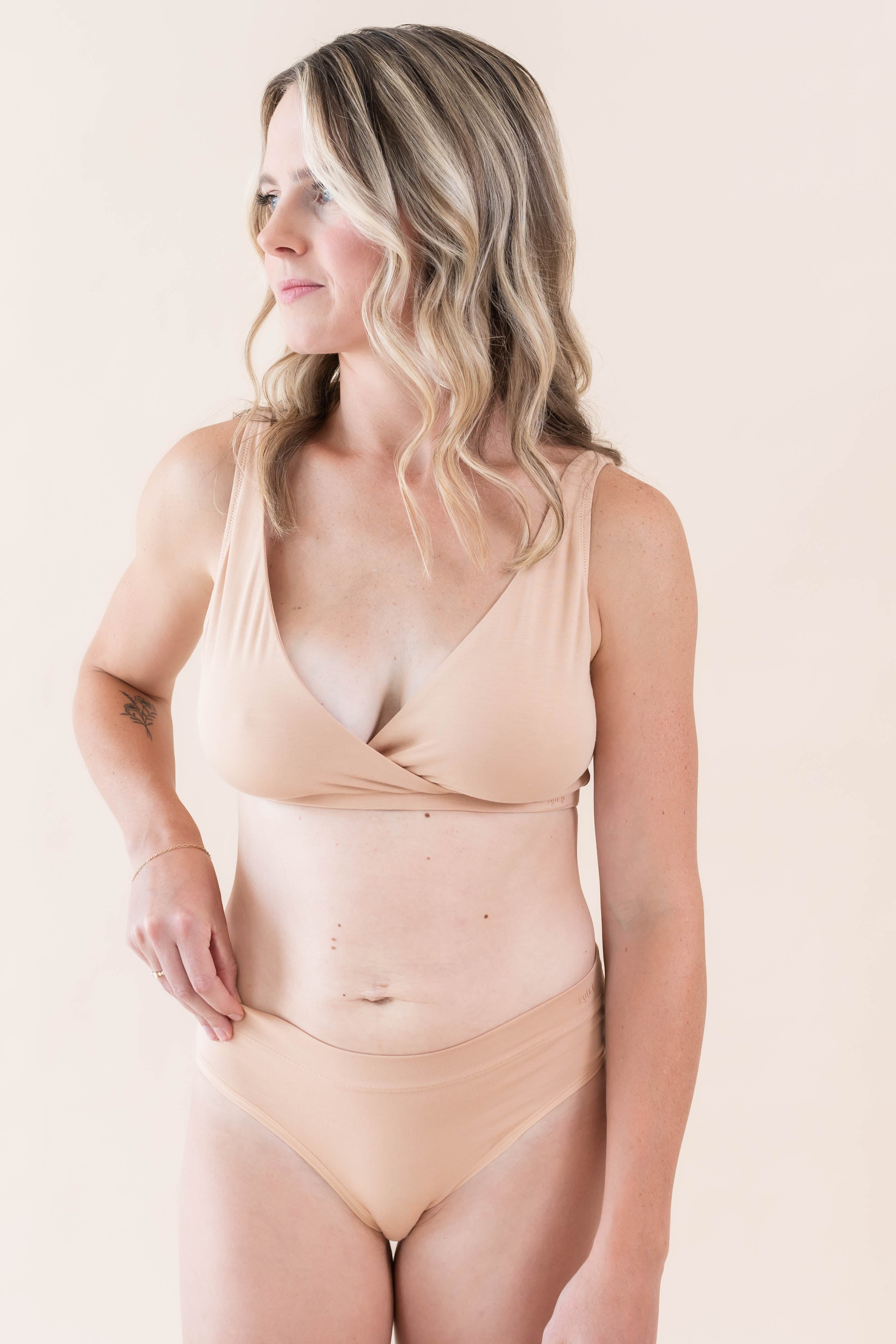 Close up of model wearing Women's Cross Front Bralette in Chai and Women's Midi Brief in Chai 