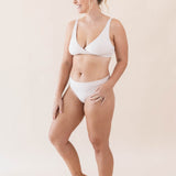Model wearing the Women's Cross Front Bralette in Blonde