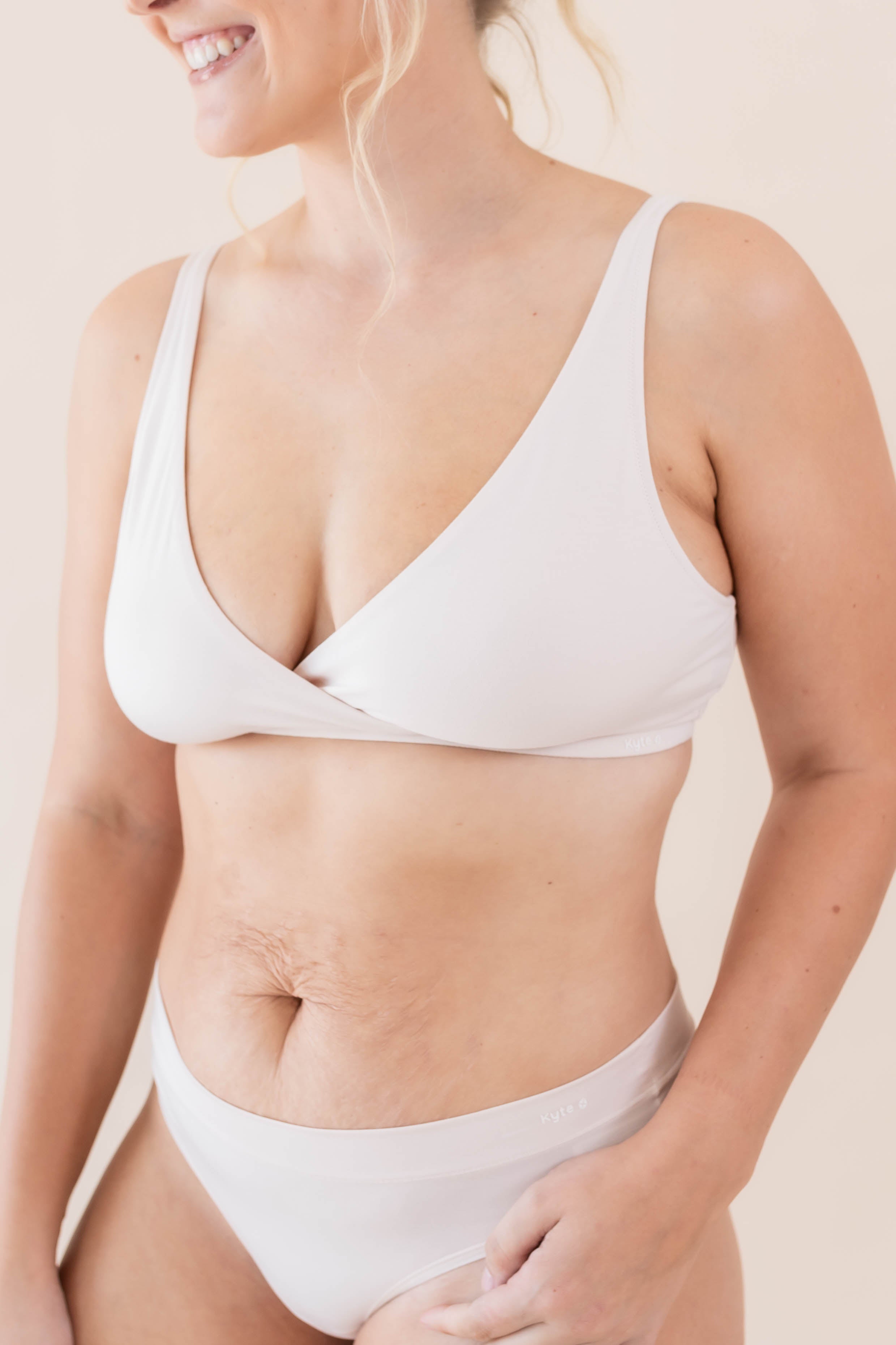 Close up of the front of the Women's Cross Front Bralette in Blonde on a model