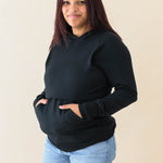 Model wearing the Women's French Terry Nursing Hoodie in Midnight