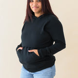 Model wearing the Women's French Terry Nursing Hoodie in Midnight