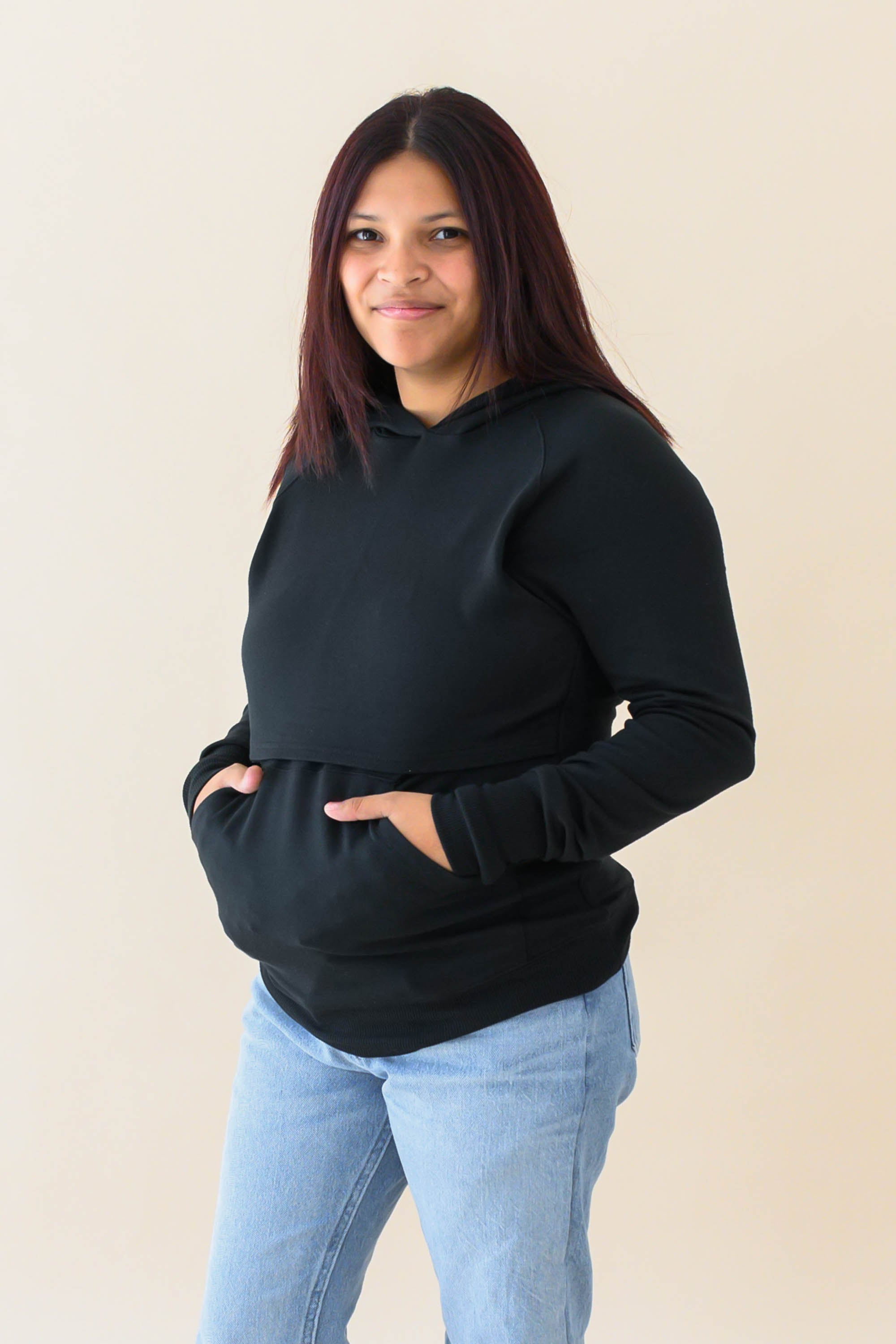 Model wearing the Women's French Terry Nursing Hoodie in Midnight