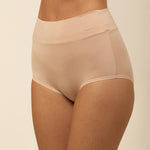 Beige high-waisted underwear on a beige background