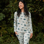 Smiling model wearing the Women's Jogger Pajama Set in Journey with one hand in jogger pant pocket