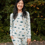Smiling model wearing Kyte Baby's Women's Jogger Pajama Set in Journey