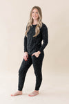 Black leopard print jogger pajamas on model