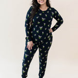 Smiling model wearing the Women's Jogger Pajama Set in Midnight Lily