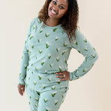 Smiling model wearing the Women's Jogger Pajama Set in Thyme Lily