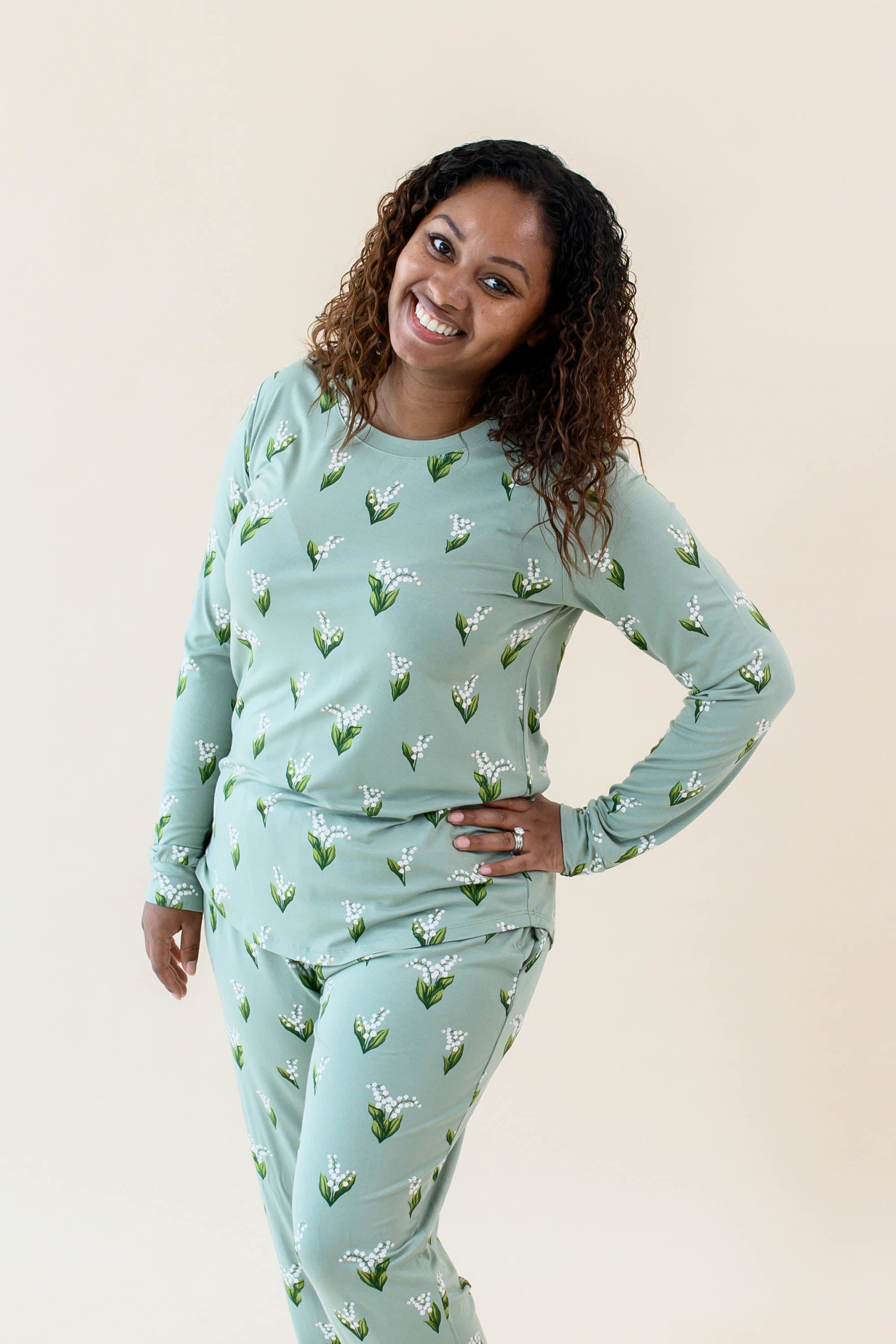 Smiling model wearing the Women's Jogger Pajama Set in Thyme Lily
