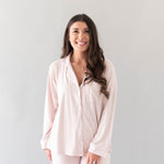 Closer photo of model wearing the Women's Long Sleeve Pajama Set in Blush with Cloud Trim