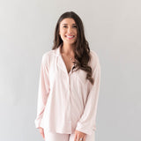 Closer photo of model wearing the Women's Long Sleeve Pajama Set in Blush with Cloud Trim