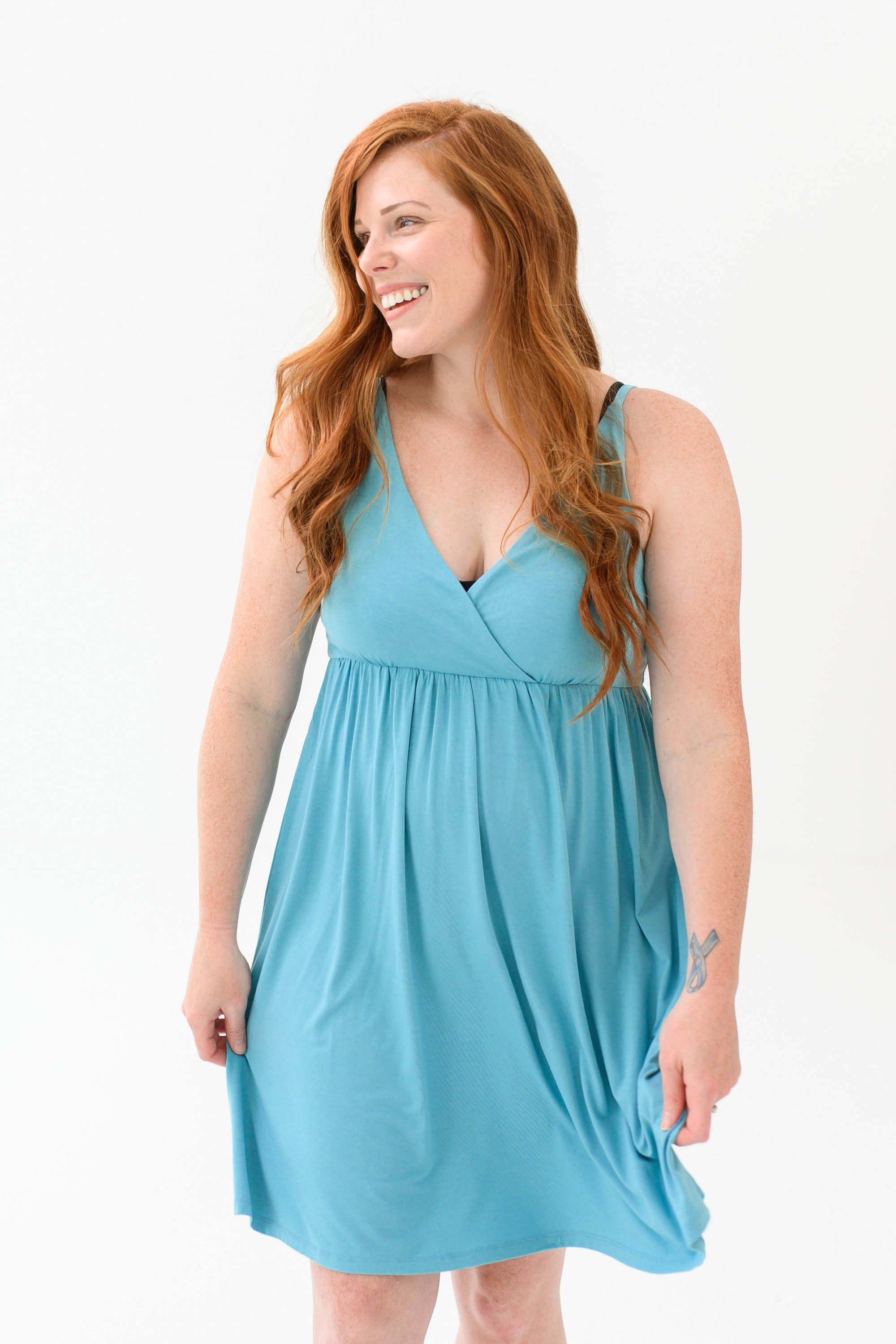 Woman modeling Kyte Baby's Women's Nightgown in Makai