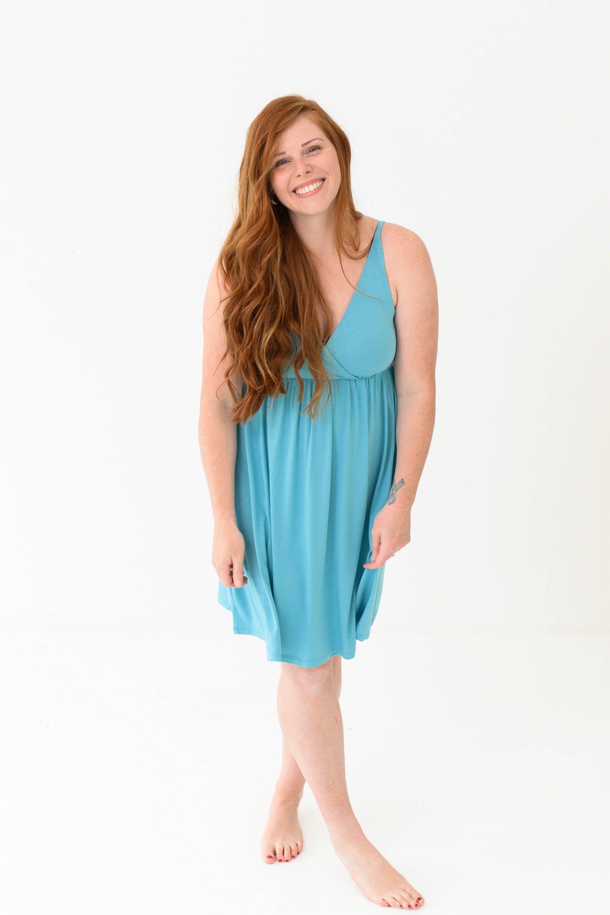 Woman modeling Kyte Baby's Women's Nightgown in Makai