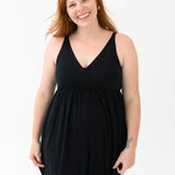 Woman modeling Kyte Baby's Women's Nightgown in Midnight