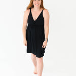 Woman modeling Kyte Baby's Women's Nightgown in Midnight