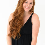 Woman modeling Kyte Baby's Women's Nightgown in Midnight