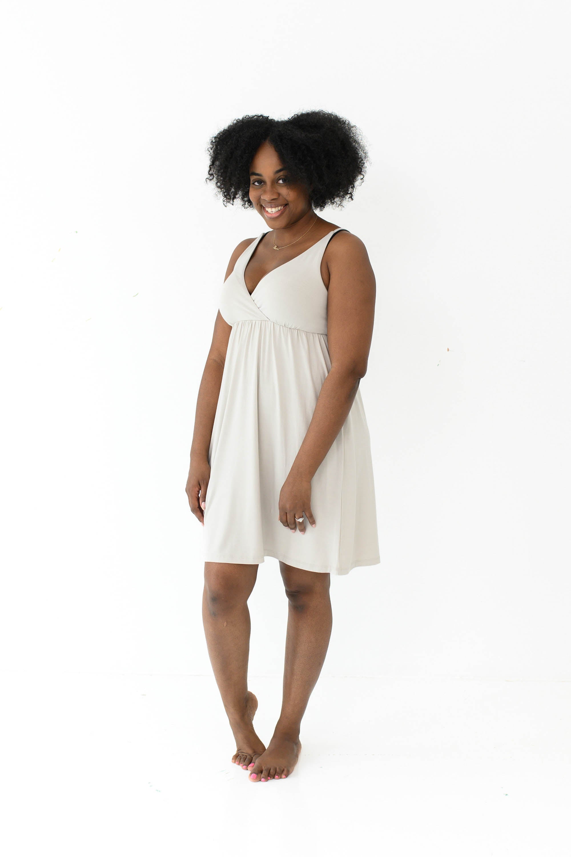 Woman modeling Kyte Baby's Women's Nightgown in Oat