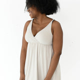 Woman modeling Kyte Baby's Women's Nightgown in Oat