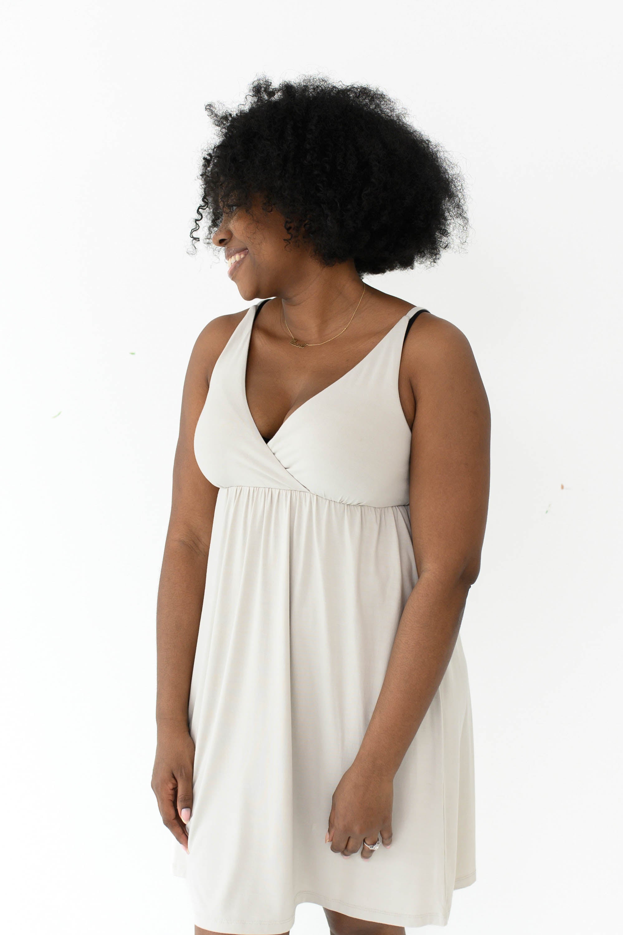 Woman modeling Kyte Baby's Women's Nightgown in Oat