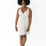 Woman modeling Kyte Baby's Women's Nightgown in Oat