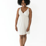 Woman modeling Kyte Baby's Women's Nightgown in Oat
