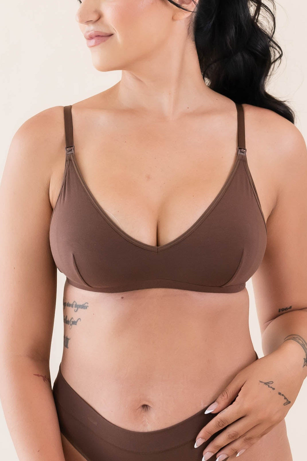 Person wearing a brown bamboo nursing bralette