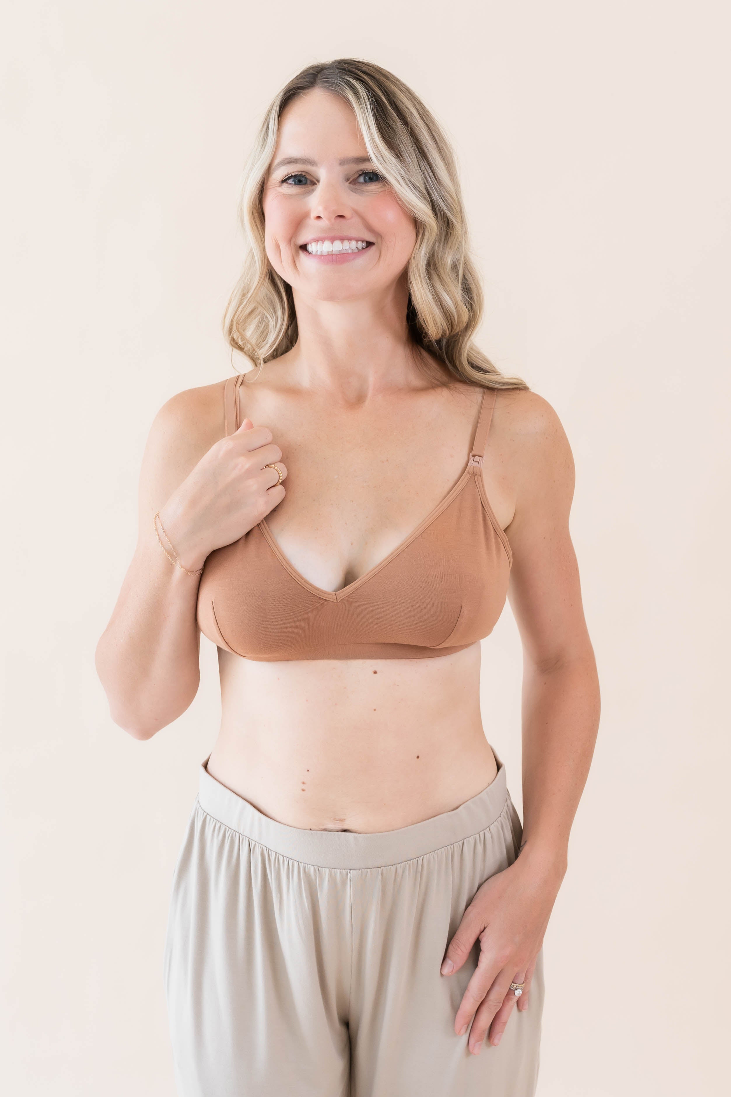 Close up of model wearing Kyte Baby's Women's Nursing Bra in Latte