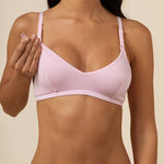 Model showcasing the clip feature on the  Women's Nursing Bra in Peony 