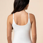 Model show casing the back and straps on the Women's Nursing Tank in Snow