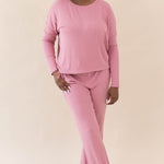 Smiling model wearing the Women's Ribbed High Waisted Wide Leg Pant in Apple Blossom