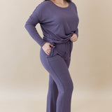 Model wearing the Women's Ribbed High Waisted Wide Leg Pant in Currant with one hand in pocket