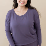 Model wearing the Women's Ribbed Long Sleeve Drop Shoulder Top in Currant paired with Currant pants
