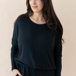 Model wearing the Women's Ribbed Long Sleeve Drop Shoulder Top in Midnight paired with Midnight Pants
