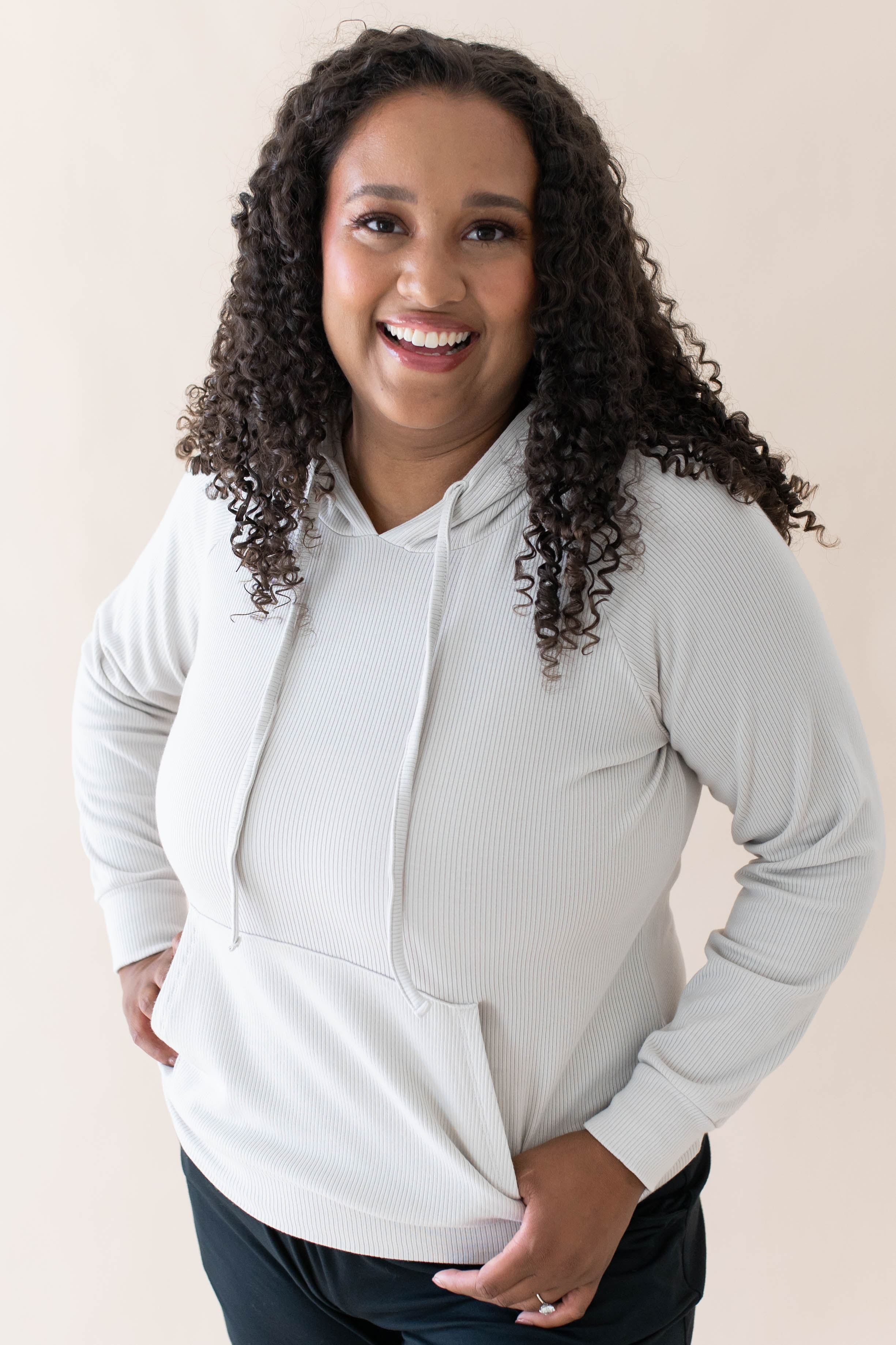Model wearing the Women's Ribbed Hoodie in Oat