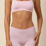 Close up of the Women's Scoop Neck Bralette and Women's Boxer in Peony on a model 